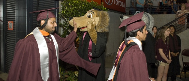 Students and Saluki Mascot at Graduation 