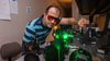 SIU student using Photonics laser 
