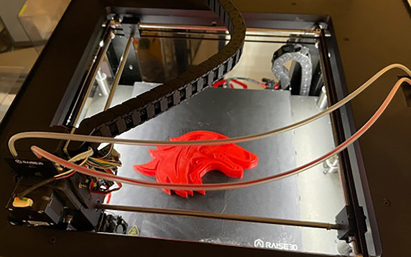 3D Printer Creating SIU Saluki Dawg Logo