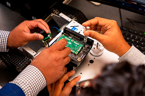 SIU Students working on a computer science project